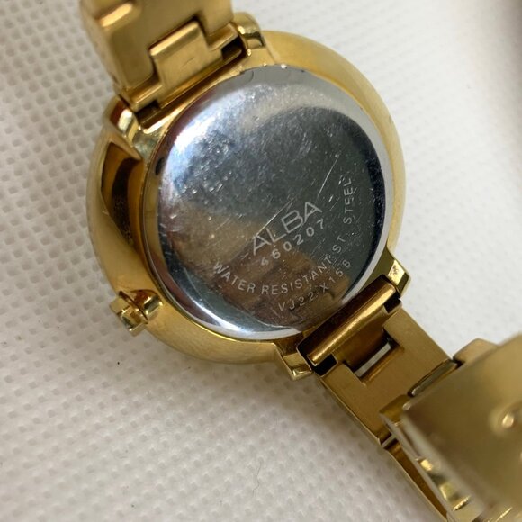 Alba gold tone women date watch 28mm analog fits a small wrist size 5” running - Picture 7 of 7
